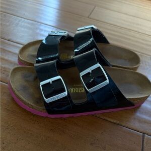 Black and pink Birkenstocks